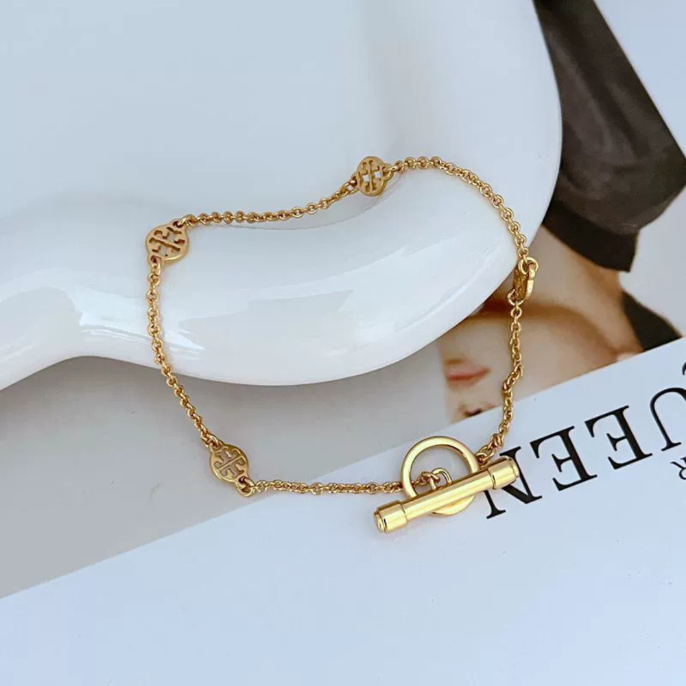 Tory Burch Geometric Circle Hollow Letter Clasp Bracelet